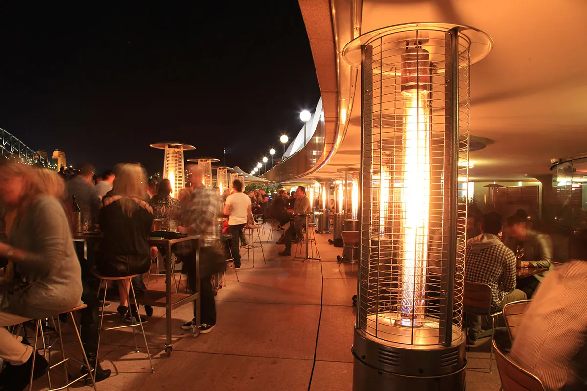 Fire Fountain patio heater in use in a Sydney venue at night